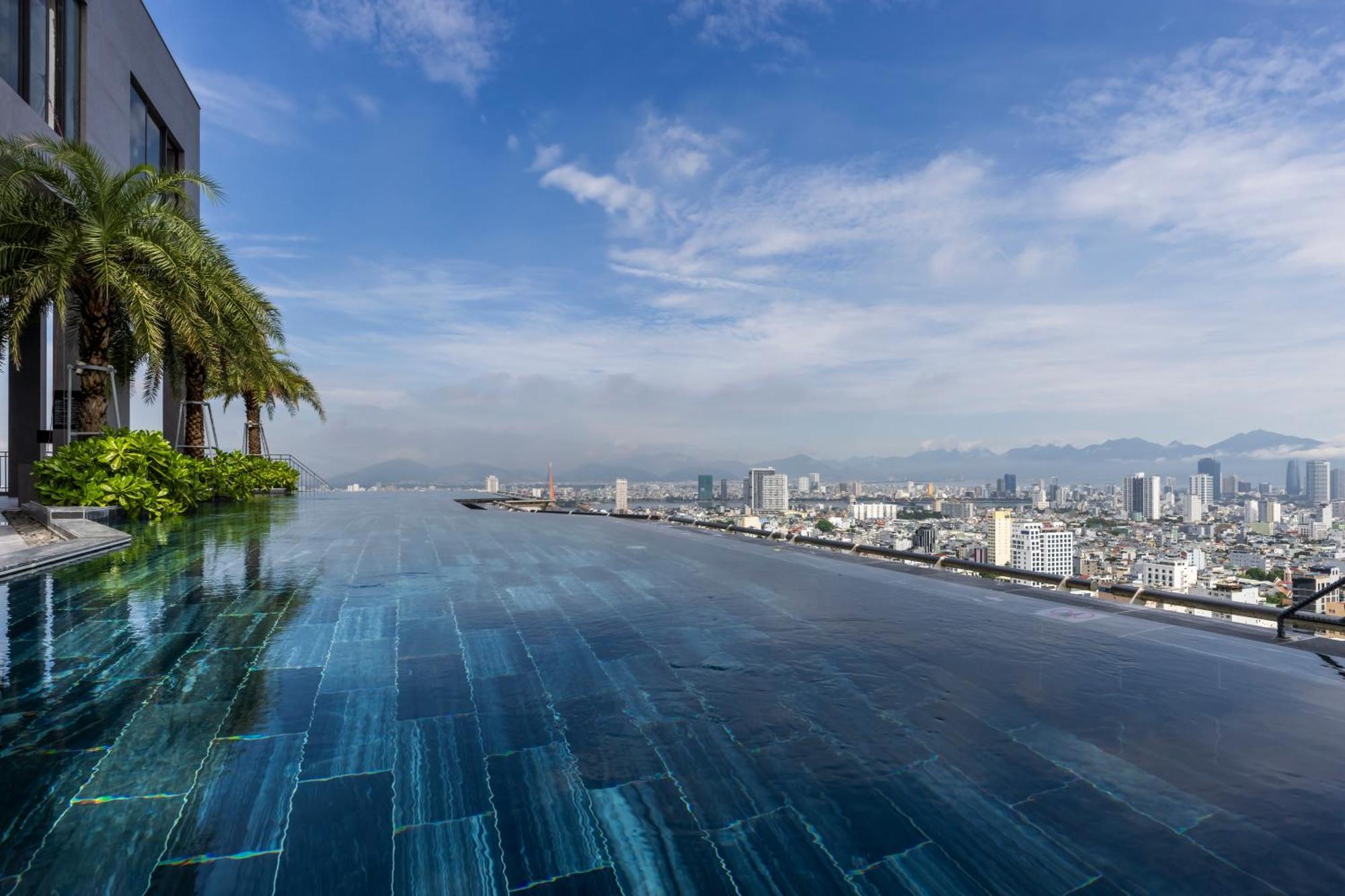 M Hotel Danang Exterior photo Infinity pool at the top of the building